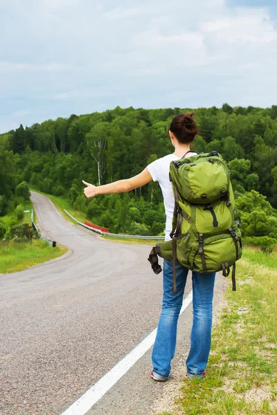 Woman with backpack — Stock Photo, Image