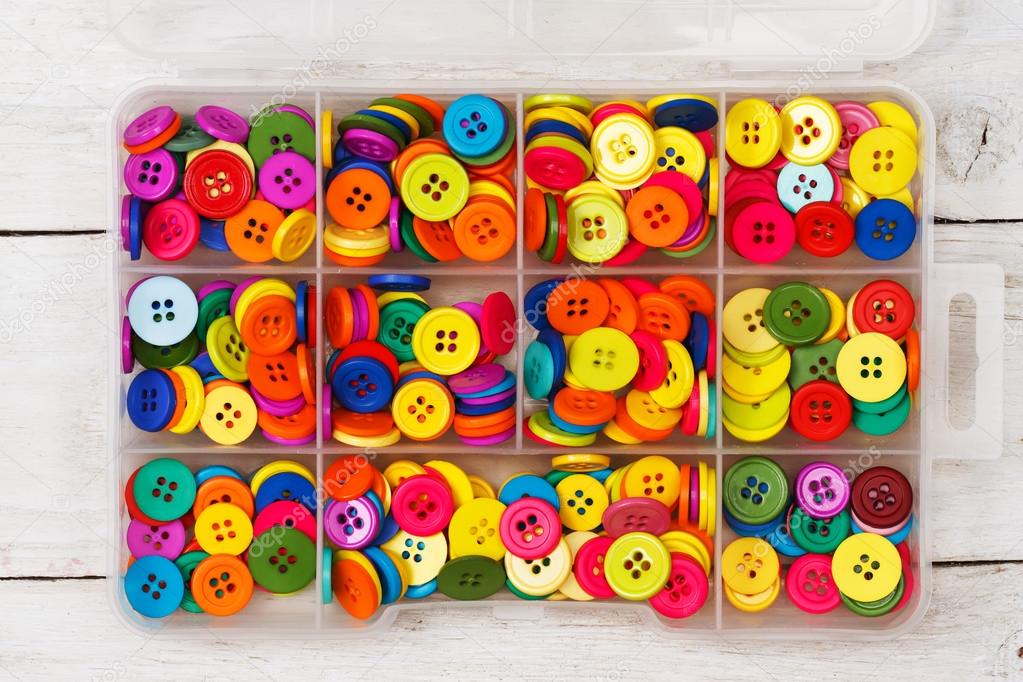 Box of colorful sewing buttons