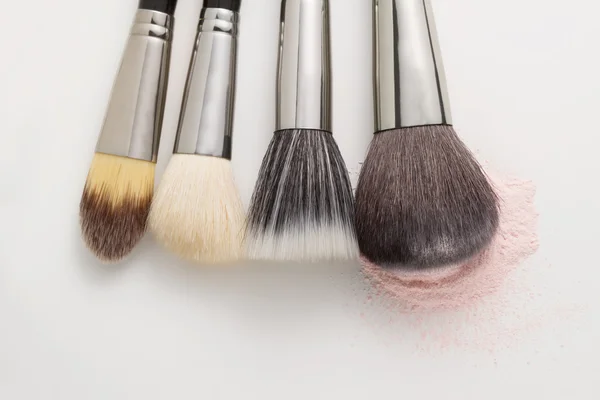 Makeup brushes on white — Stock Photo, Image