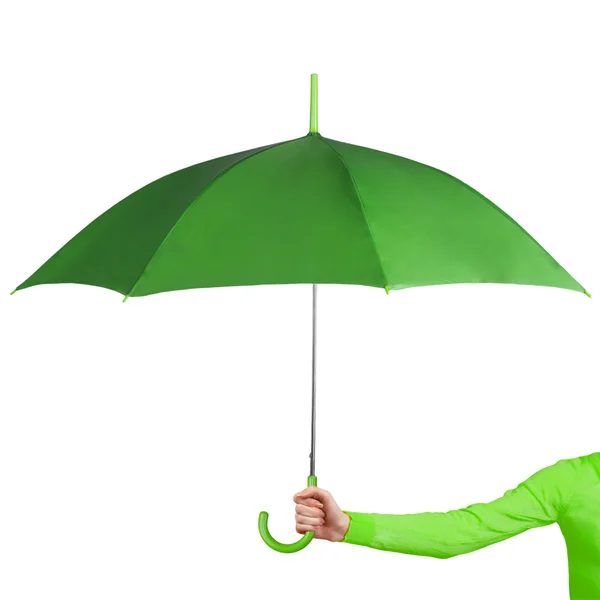 Green umbrella in hand — Stock Photo, Image