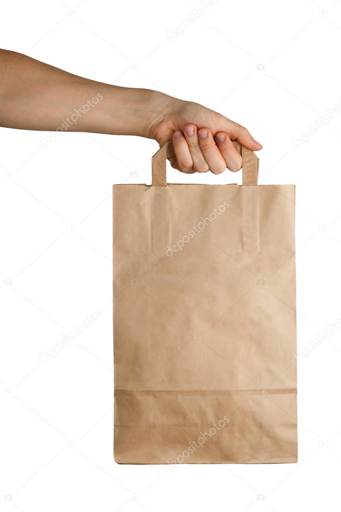 Hand holding a paper bag
