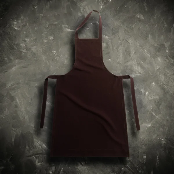 Brown fabric apron — Stock Photo, Image