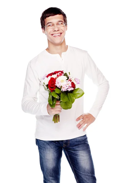 Хлопець з букетом квітів — стокове фото