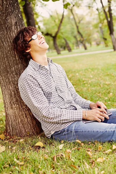 Laughing teenager in park — Stock Photo, Image