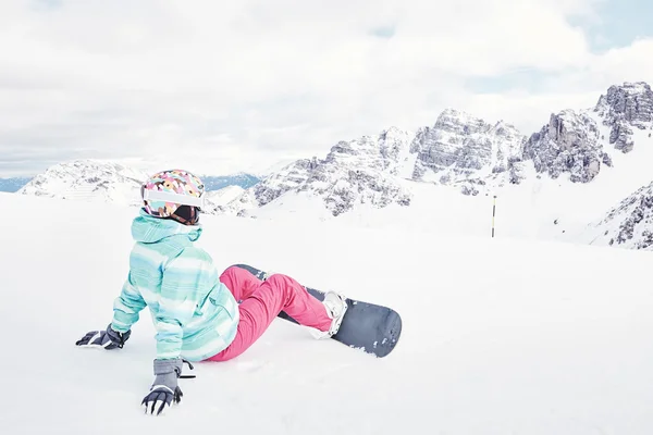 Young woman with snowboard — Stock Photo, Image