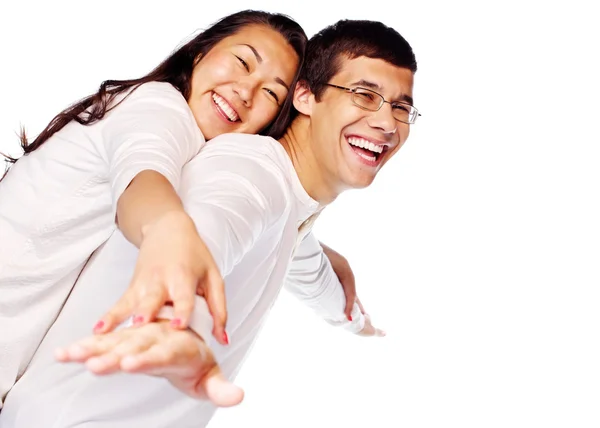 Feliz jovem interracial casal posando como voar — Fotografia de Stock