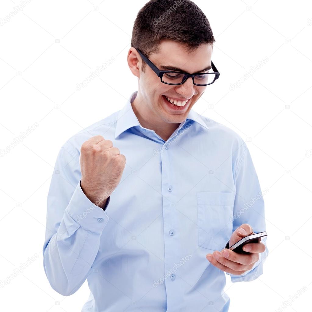 Excited guy reading good news by smartphone