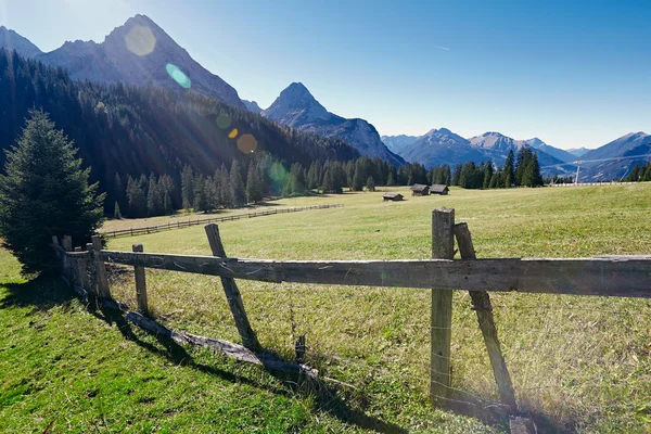 Sunny landscape of mountain village — Stock Photo, Image