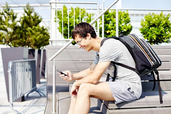 Guy using smartphone — Stock Photo, Image