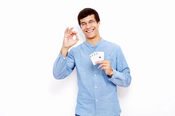 Man met kaarten en goed teken — Stockfoto