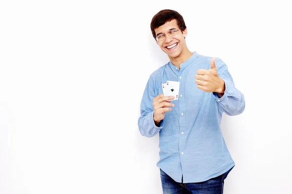 Guy with cards and thumb up sign — Stock Photo, Image