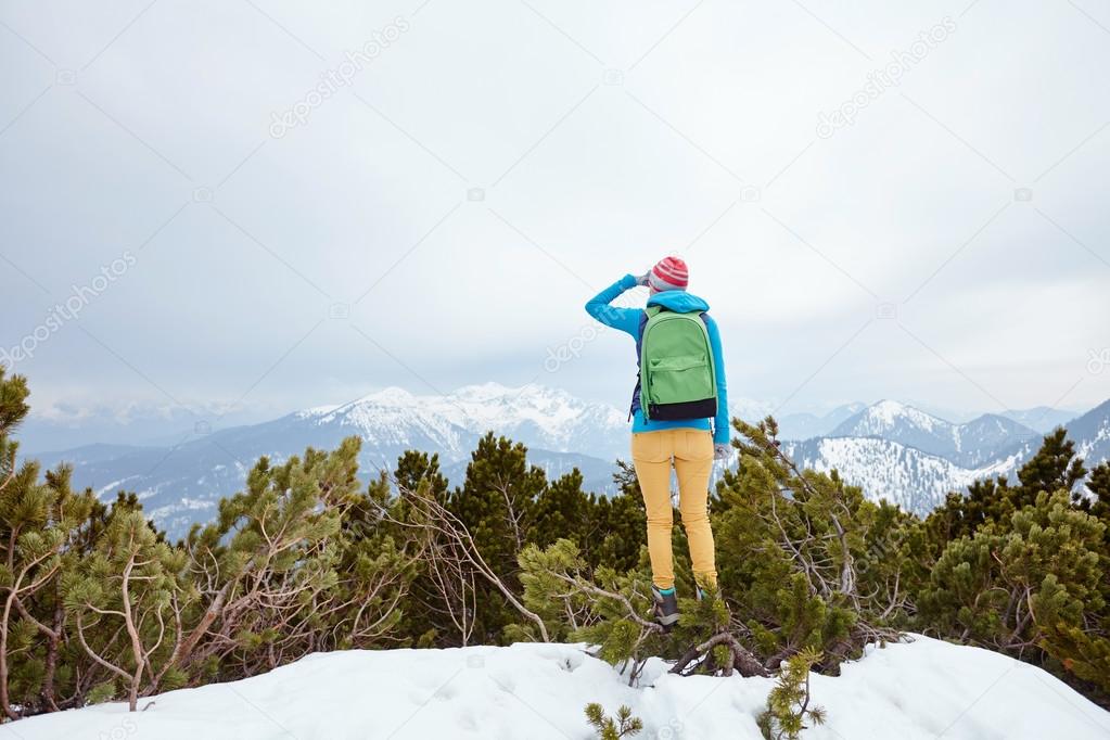 Girl looking to mountains