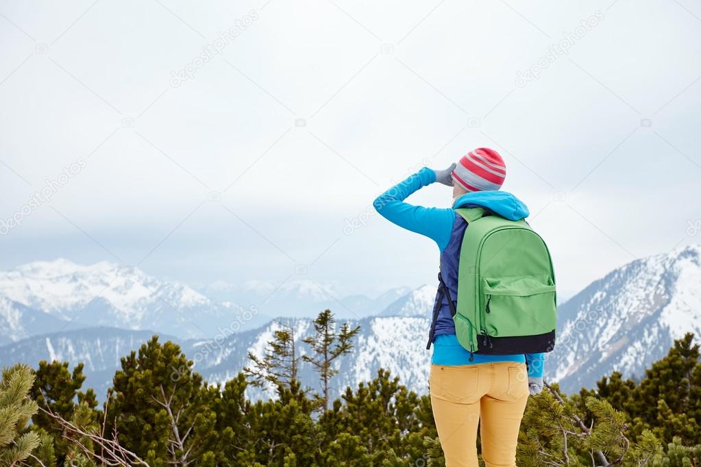Girl looking to mountains