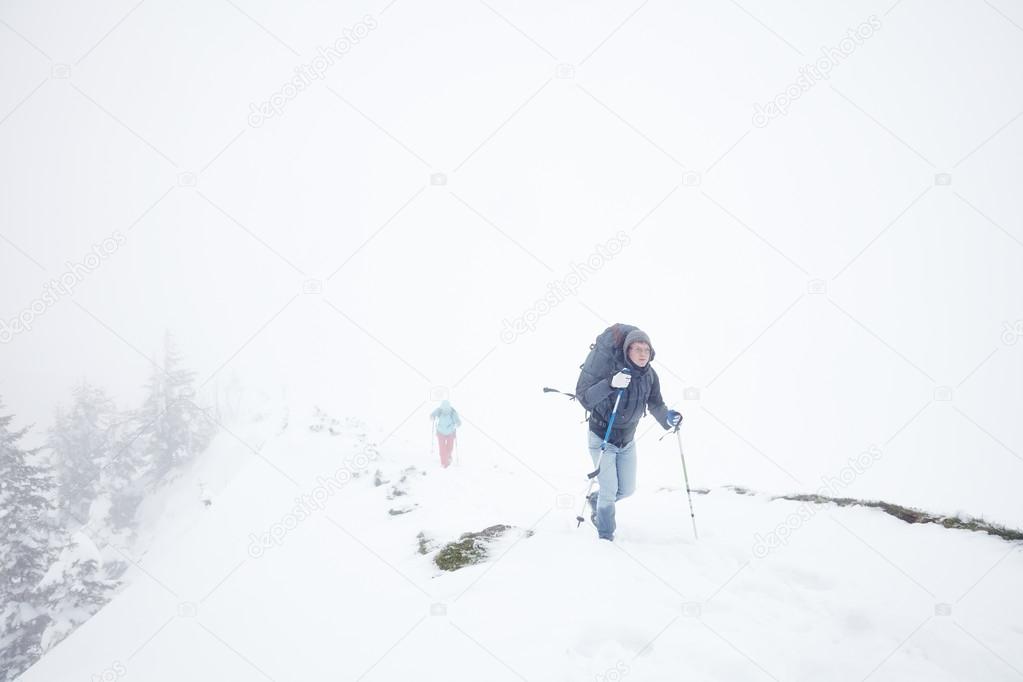 Extreme winter hiking in Alps