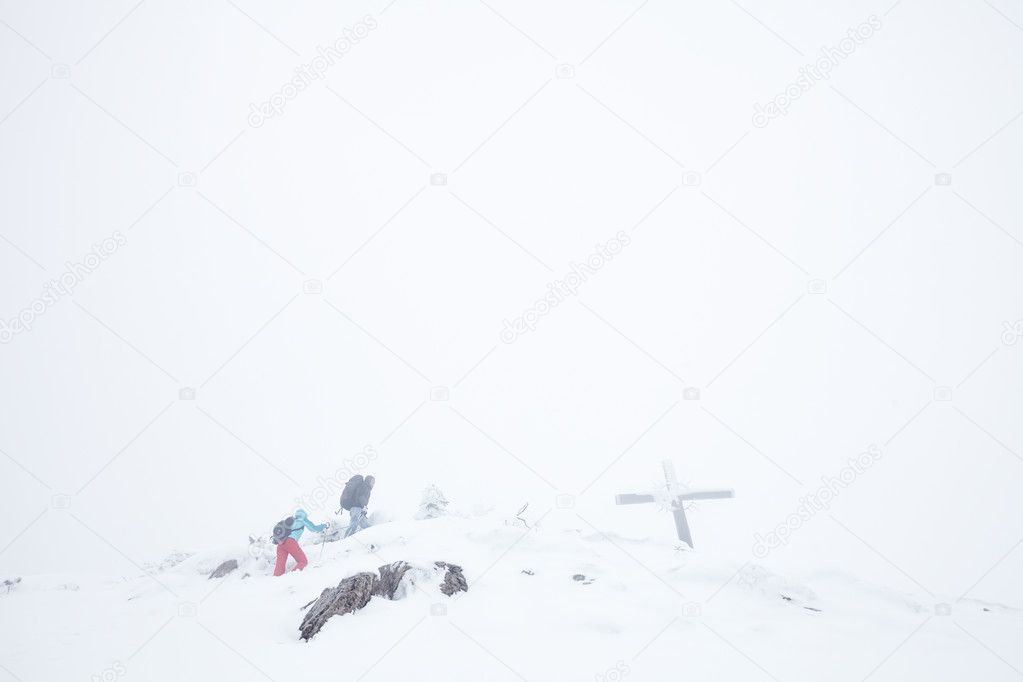 Winter hikers on top