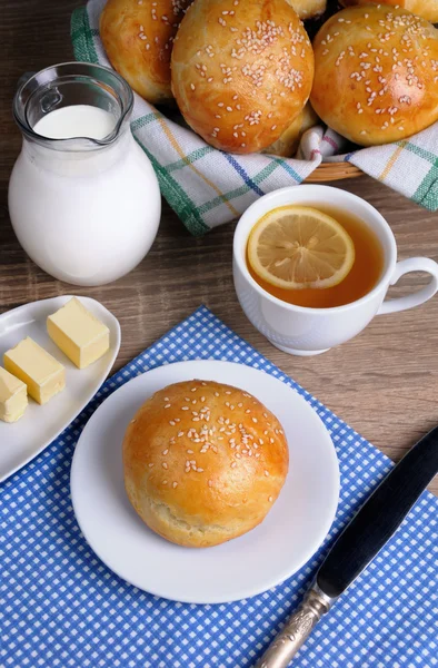 Buns with sesame seeds for breakfast — Stock Photo, Image