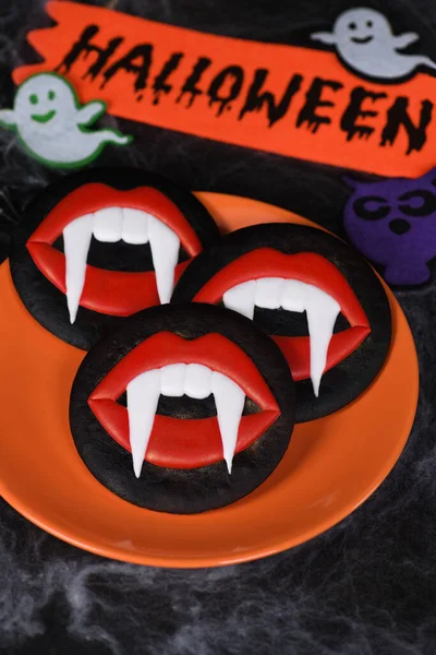 Vampire Fangs Protruding Scarlet Lips Glazed Honey Gingerbread Cookies Halloween — Stock Photo, Image