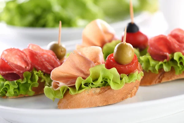 Tender Baguette Canapes Leaf Lettuce Salami Parma Ham Tomatoes Mozzarella — Stock Photo, Image