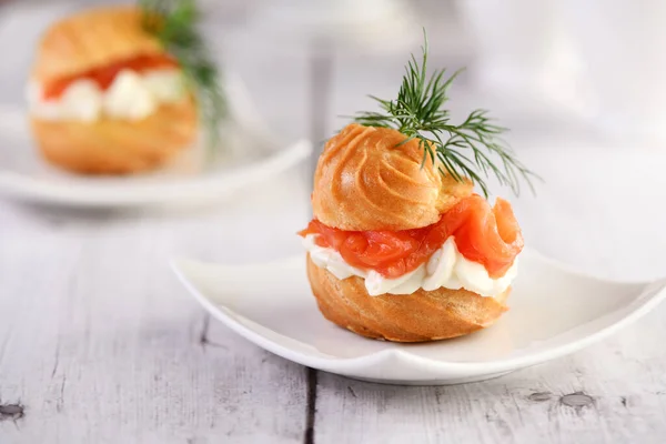 Profiteroles Stuffed Cream Cheese Salmon Decorated Sprig Dill Close — Stock Photo, Image