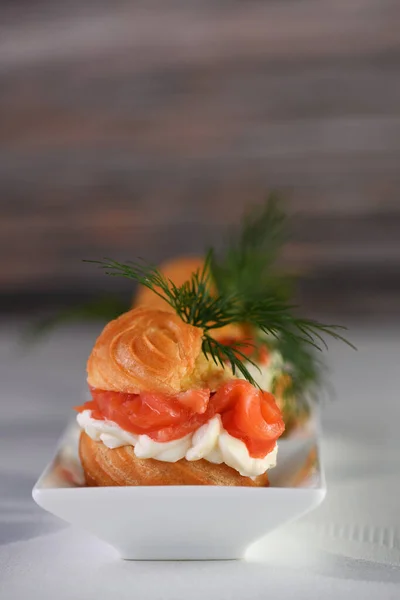 Profiteroles Stuffed Cream Cheese Salmon Decorated Sprig Dill Close — Stock Photo, Image