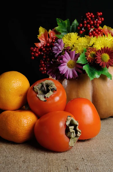 Persimmons, tangerines — Stock Photo, Image