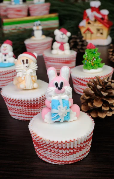 Sugar Christmas figurine hare on muffin — Stock Photo, Image