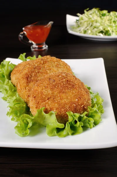 Chicken cutlets in breadcrumbs — Stock Photo, Image