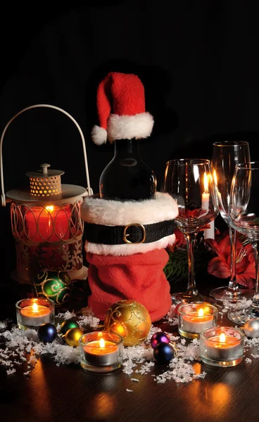 Bottle of wine in Christmas attire — Stock Photo, Image