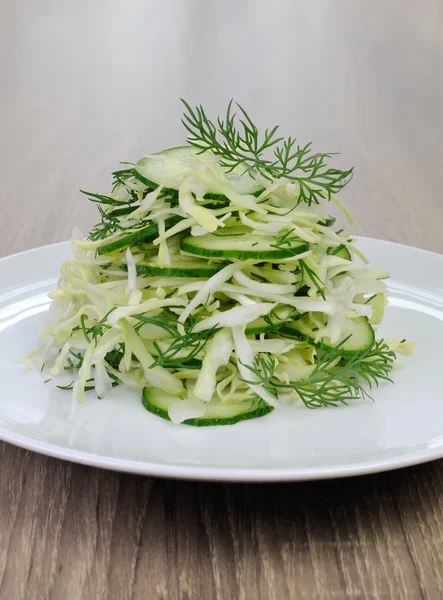 Cabbage salad with cucumber — Stock Photo, Image