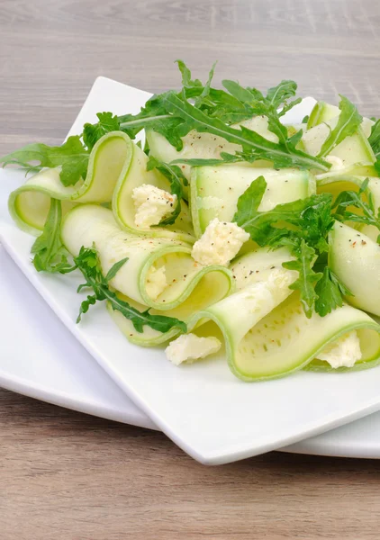 Zucchini salad with arugula and feta — Stock Photo, Image