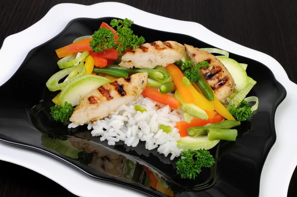 Rice with slices of chicken breast — Stock Photo, Image