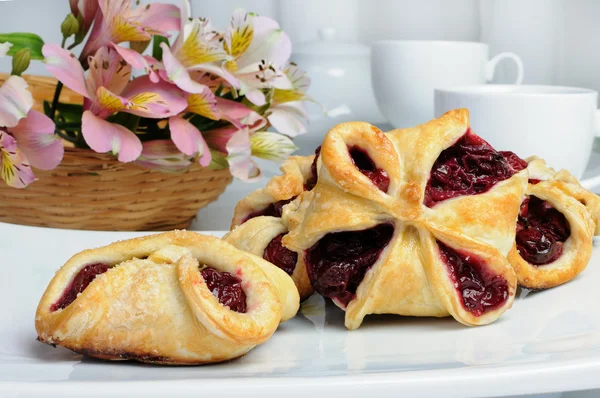 Bun with cherries — Stock Photo, Image