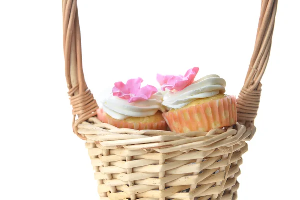 Cakes in wicker basket — Stock Photo, Image