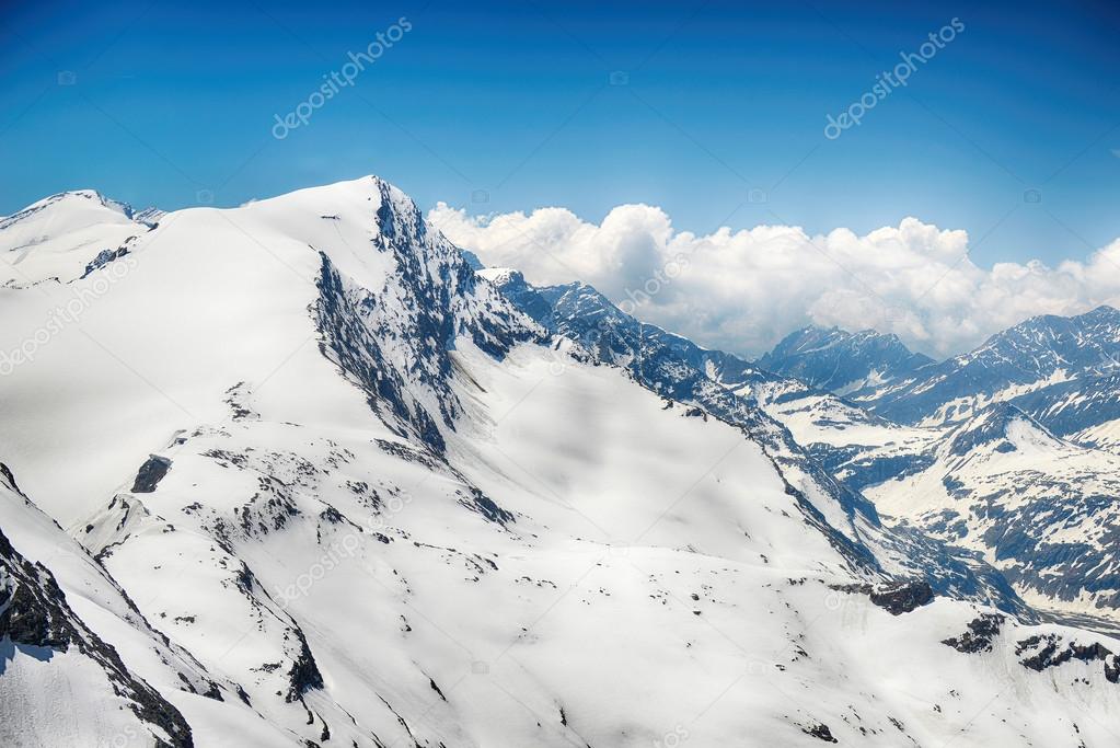 capped mountain peaks