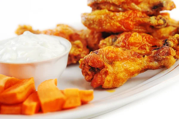 Chicken hot wings and carrots — Stock Photo, Image