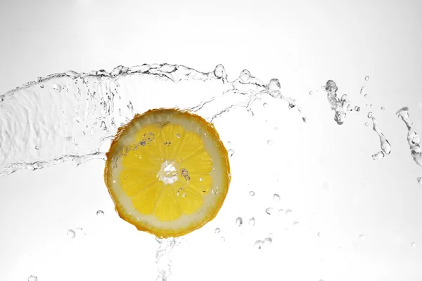 Slice of lemon in  water Stock Image