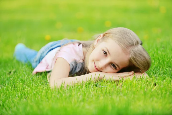 Little girl  on  grass Royalty Free Stock Photos