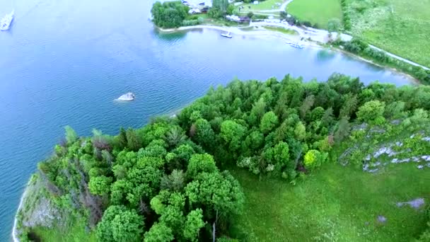 Aerial view of castle on lake bank — Stock Video