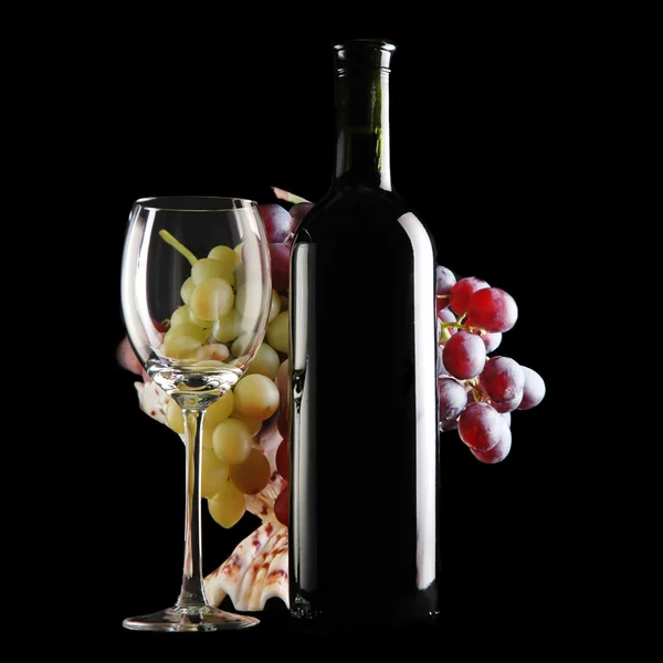 Different grapes and glass of wine — Stock Photo, Image