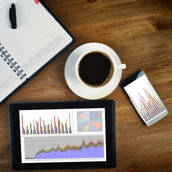 Notebook and cup of coffee — Stock Photo, Image