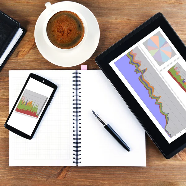 Notebook and cup of coffee — Stock Photo, Image