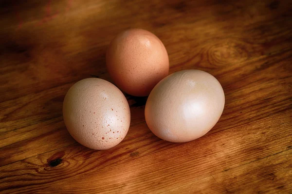 Three chicken eggs — Stock Photo, Image