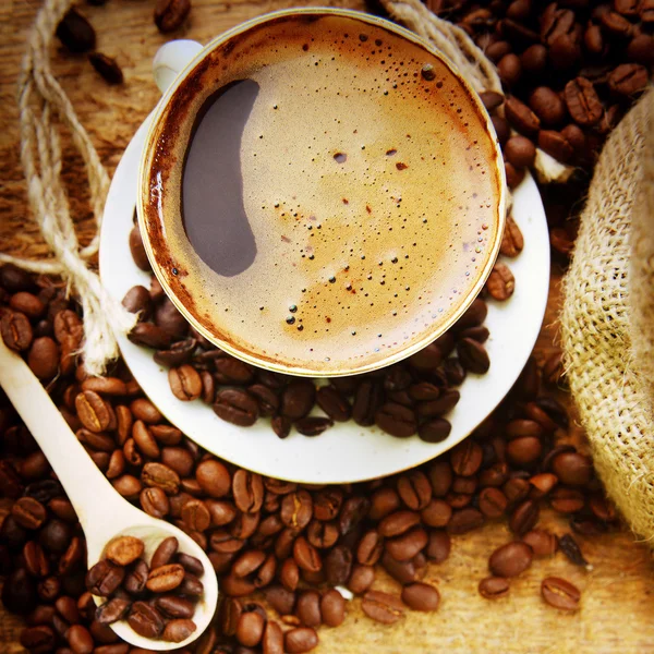 Coffee beans and cup — Stock Photo, Image