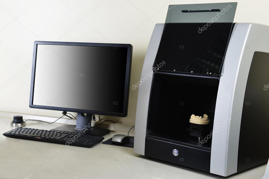 Computer  and scanner on  desktop