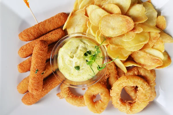 Tasty fish sticks and potatoes — Stock Photo, Image