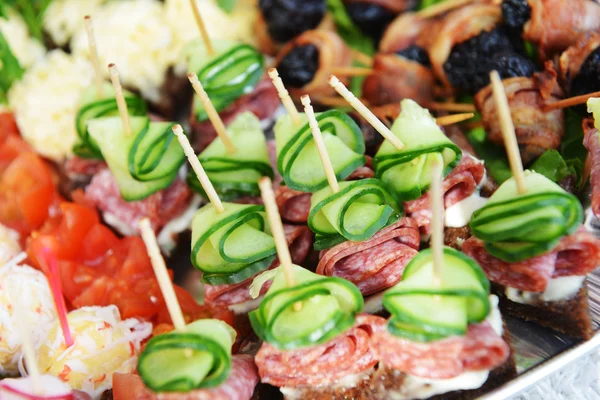 Snack with vegetables on  chopsticks — Stock Photo, Image