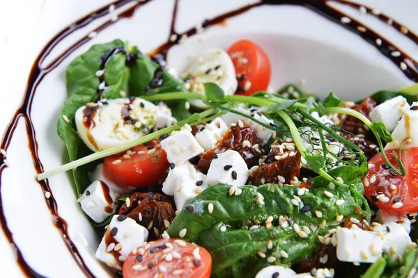 Tasty salad on dish — Stock Photo, Image