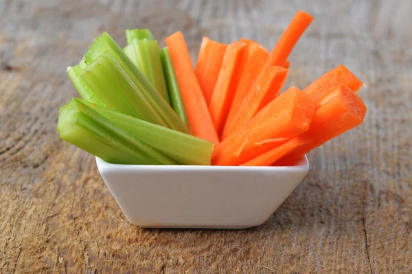 Bowl of carrot and celery — Stock Photo, Image