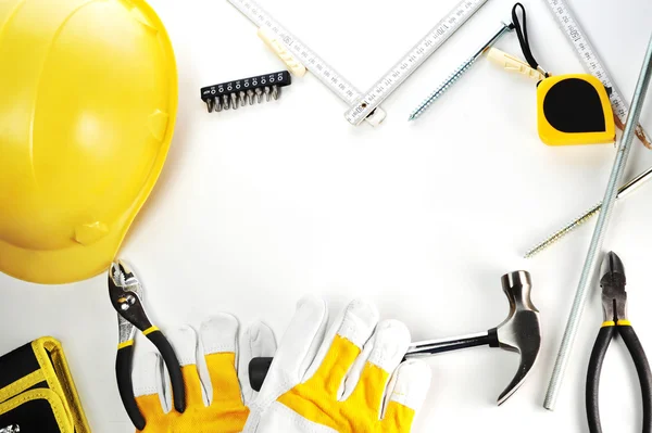 Hardhat, gloves and tools — Stock Photo, Image