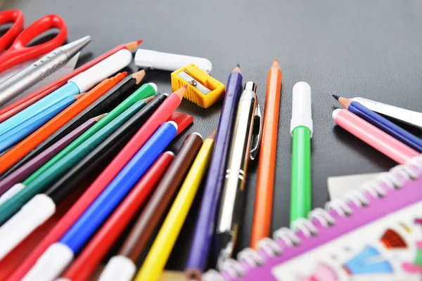 Notebook and other school supplies — Stock Photo, Image